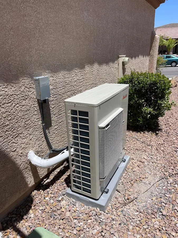 Residential air conditioning condenser unit in Audubon